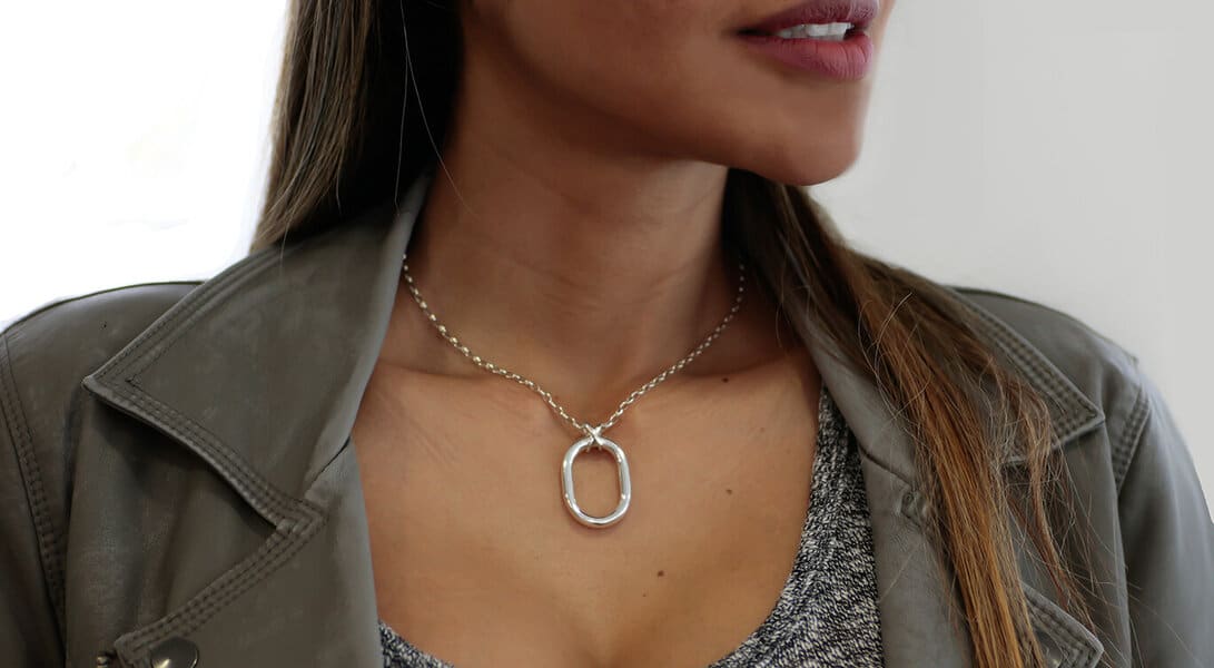 Women wearing custom designed jewellery - pendant